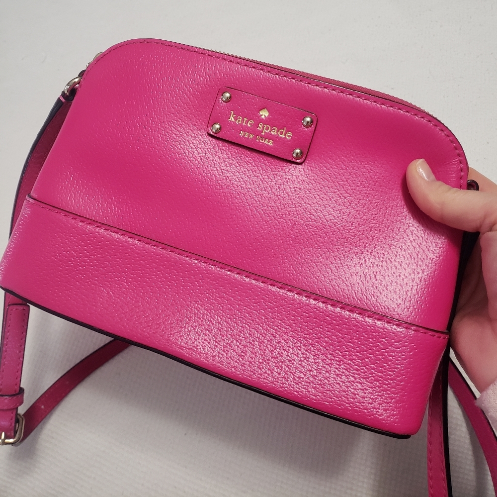 Kate Spade pink crossbody purse.